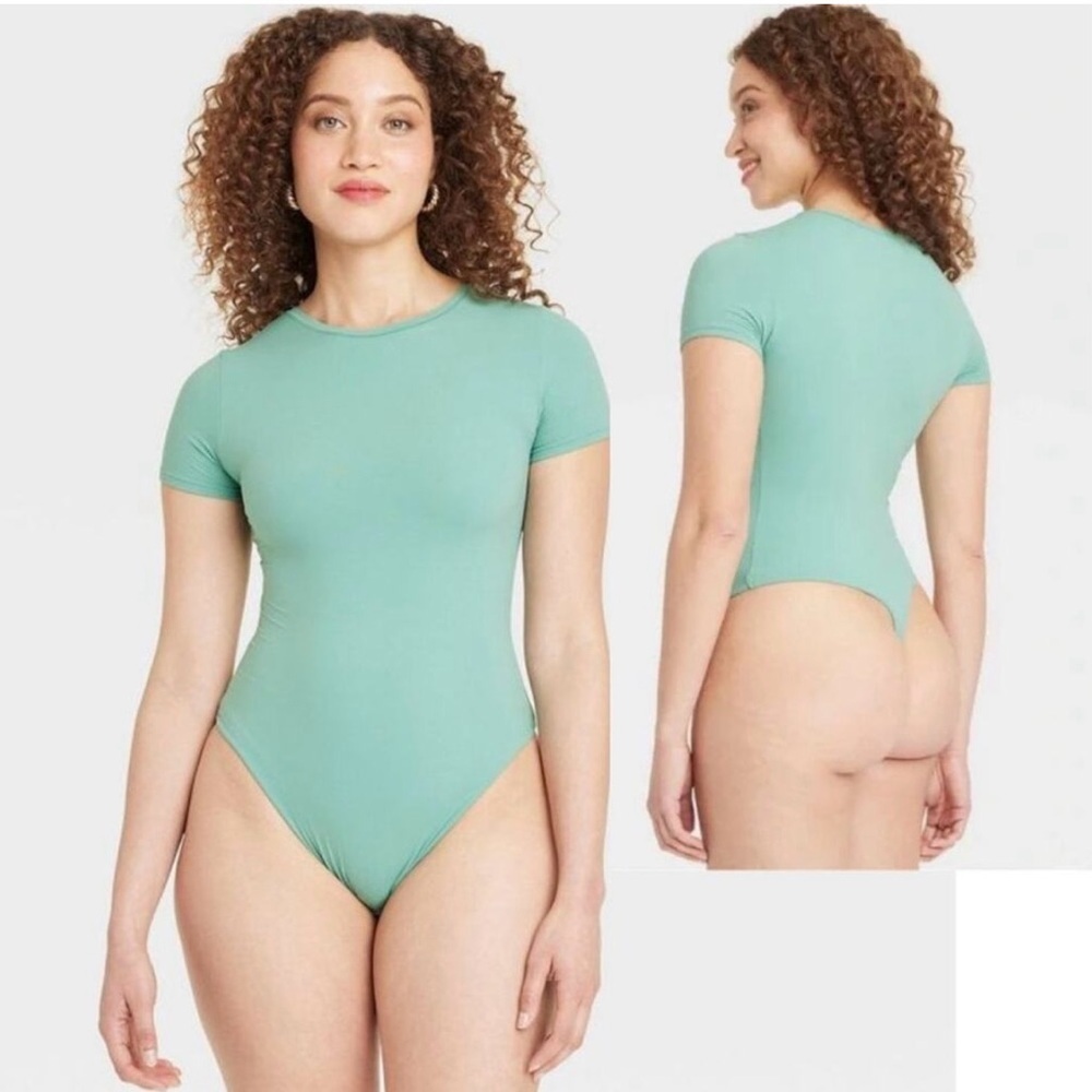 Aqua Woman’s One Piece Bodysuit